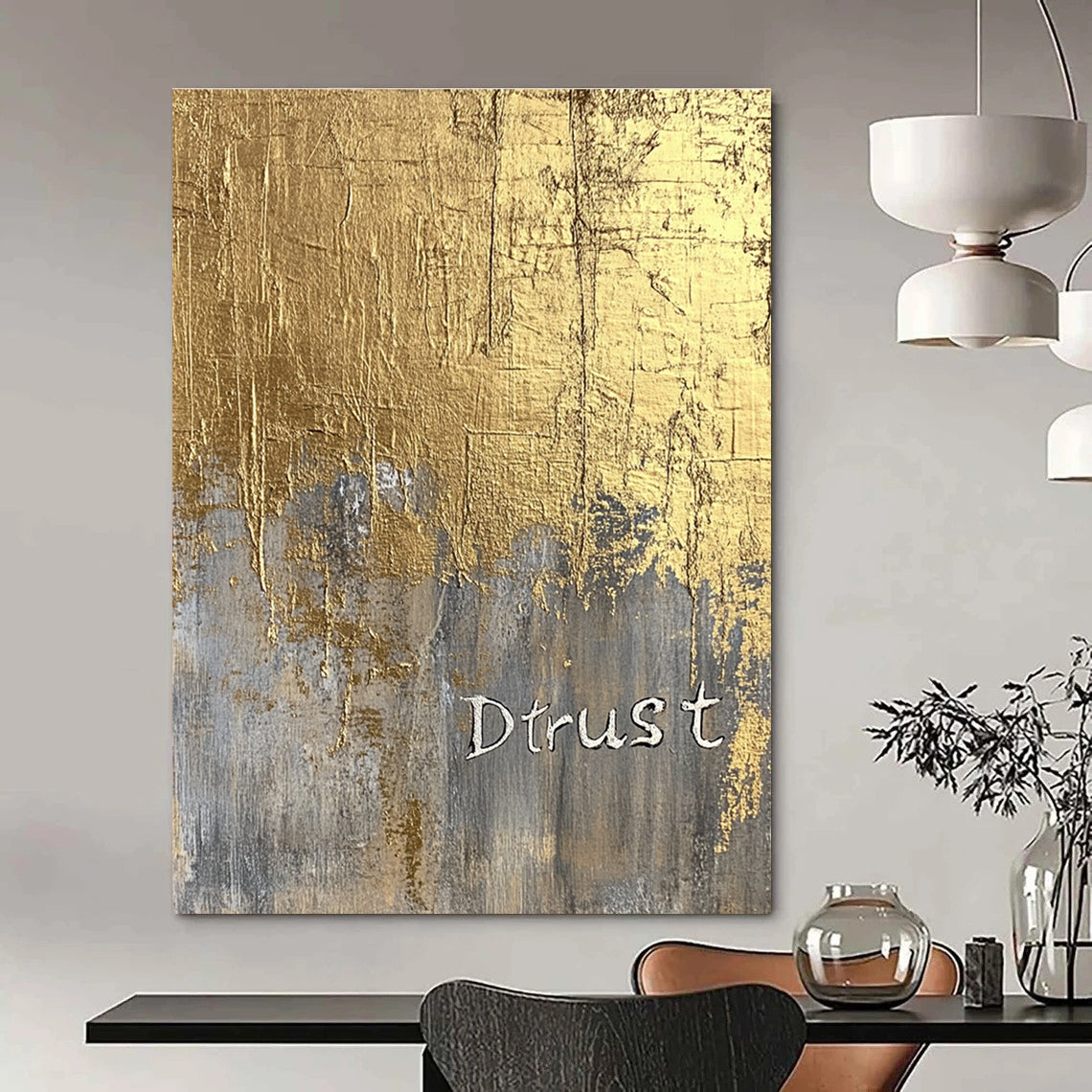A large abstract painting featuring a gold foil background and textured silver lettering of Dtrust with elegant luxury and depth.STSC1003