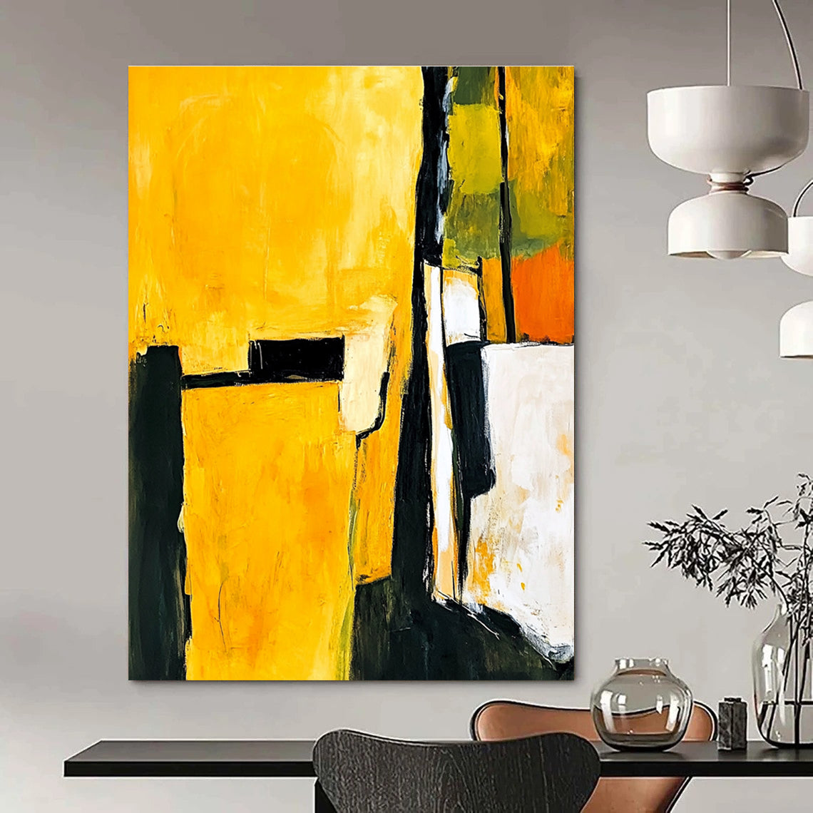 Abstract painting in yellow and black featuring white shapes with a minimalist atmosphere and an armchair in the foreground.STSC718