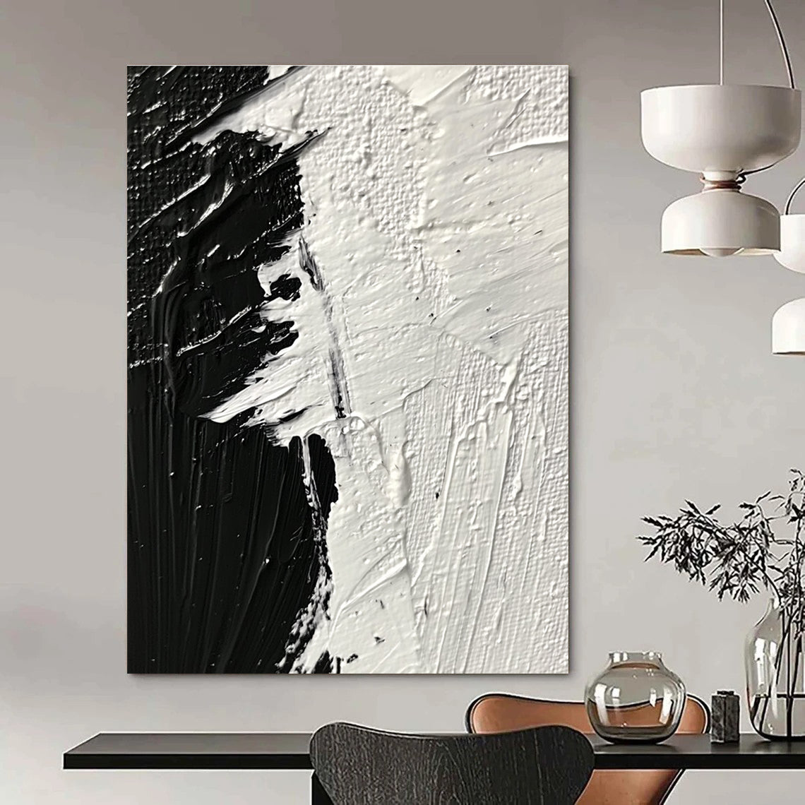 Large abstract painting featuring thick textured brushstrokes in striking black and white tones that evoke profound emotion and creativity.STSC1282