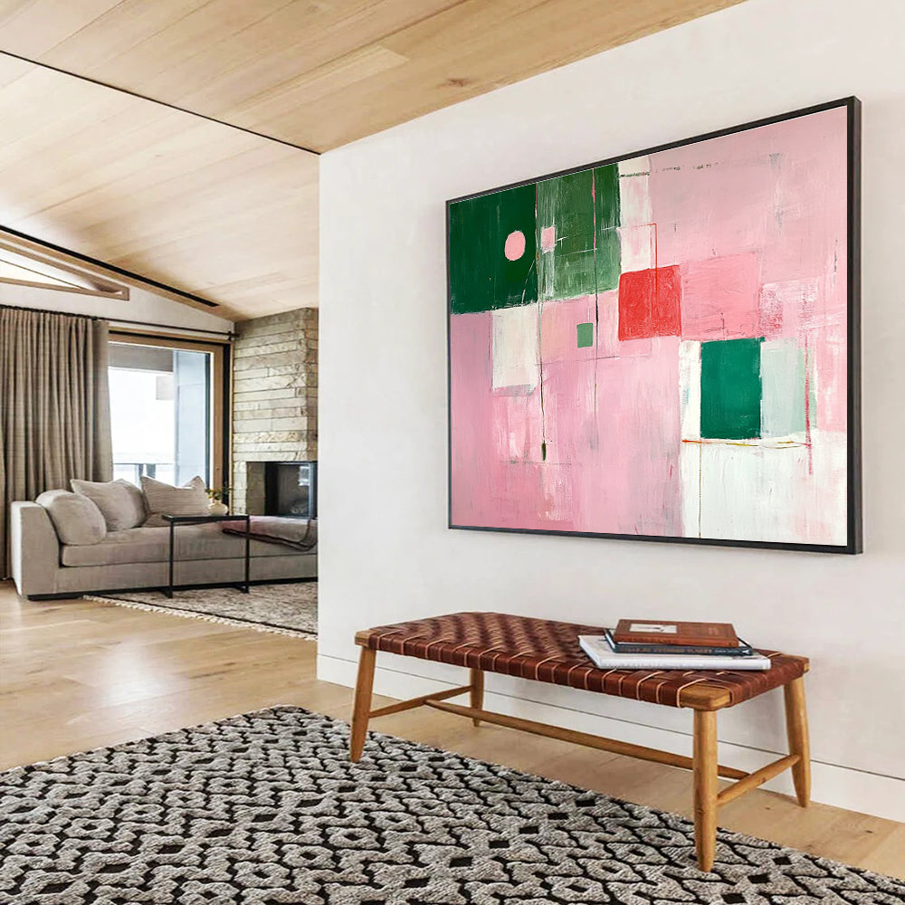A large abstract painting featuring soft pink and green shapes creates a calming atmosphere with an inviting glow and an empty center.SC538