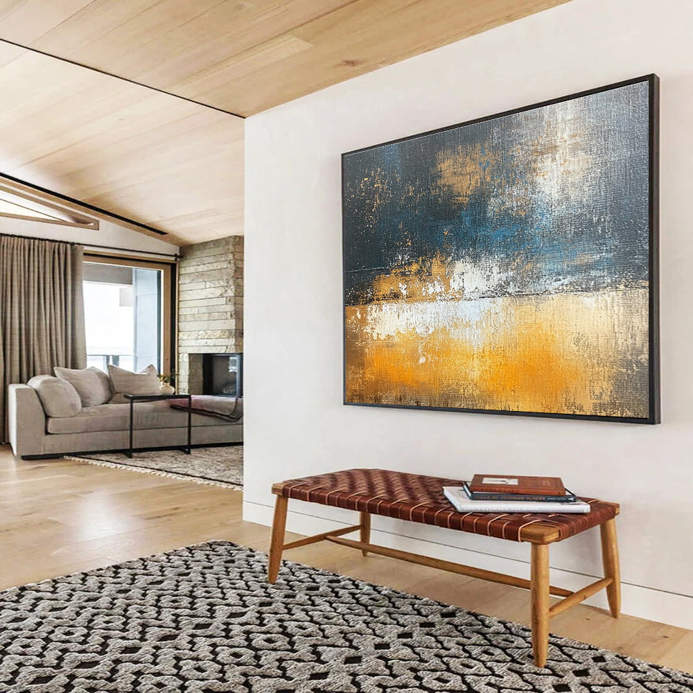 Large abstract oil painting depicting an urban landscape in dark gray and light amber with brown and blue accents using large brush strokes.SC109