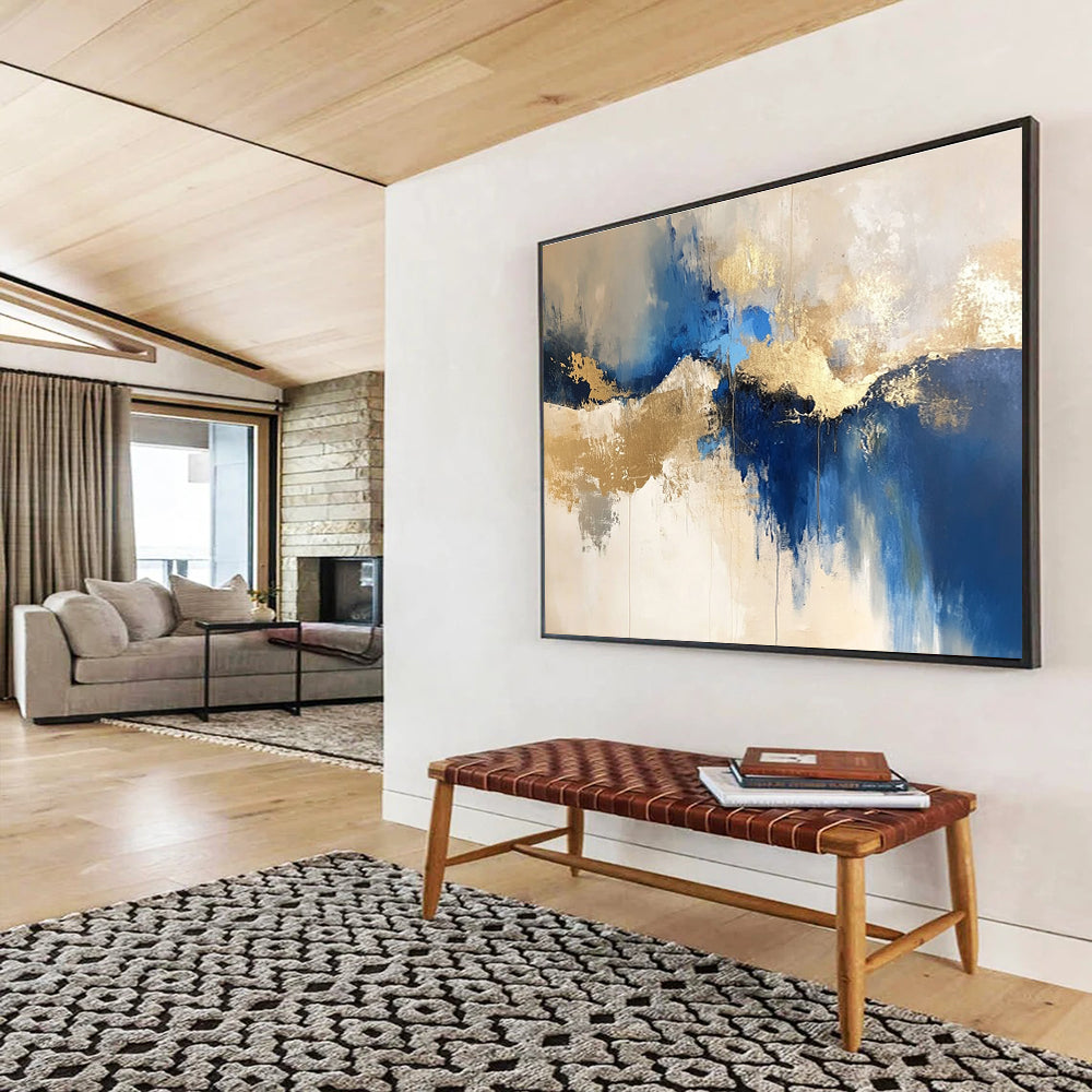 Large abstract blue and gold painting on a white background with elegant beige tones, ideal for modern decor and artistic spaces.SC022
