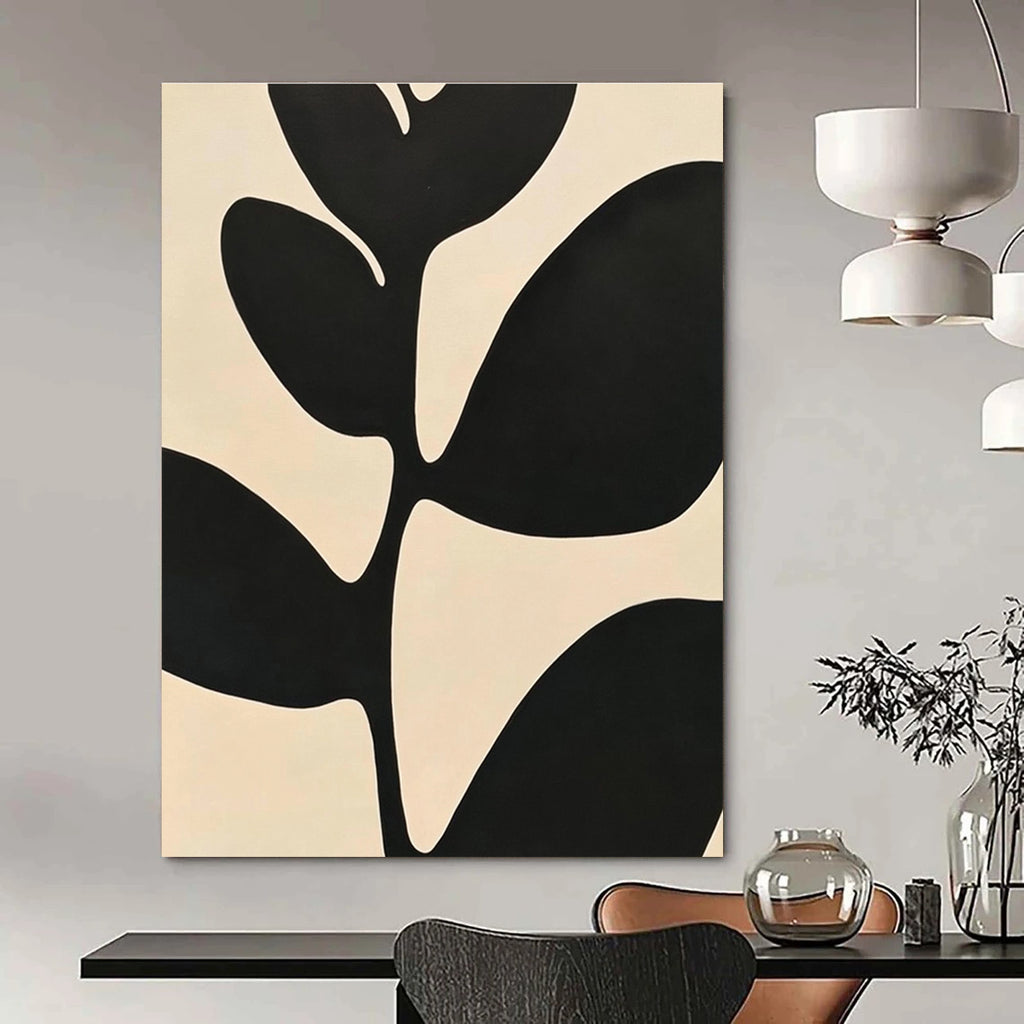 Large abstract painting featuring minimalist black and white leaves with high contrast against a simple background inspired by Matisse.STSC1080