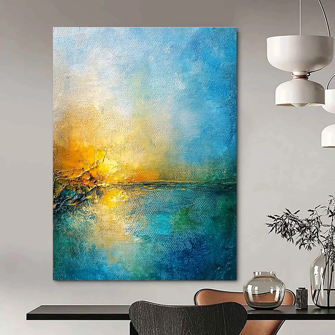 Large abstract painting of a golden sunset over a blue sea featuring textured canvas and rustic-core style nature-inspired colors.STSC165