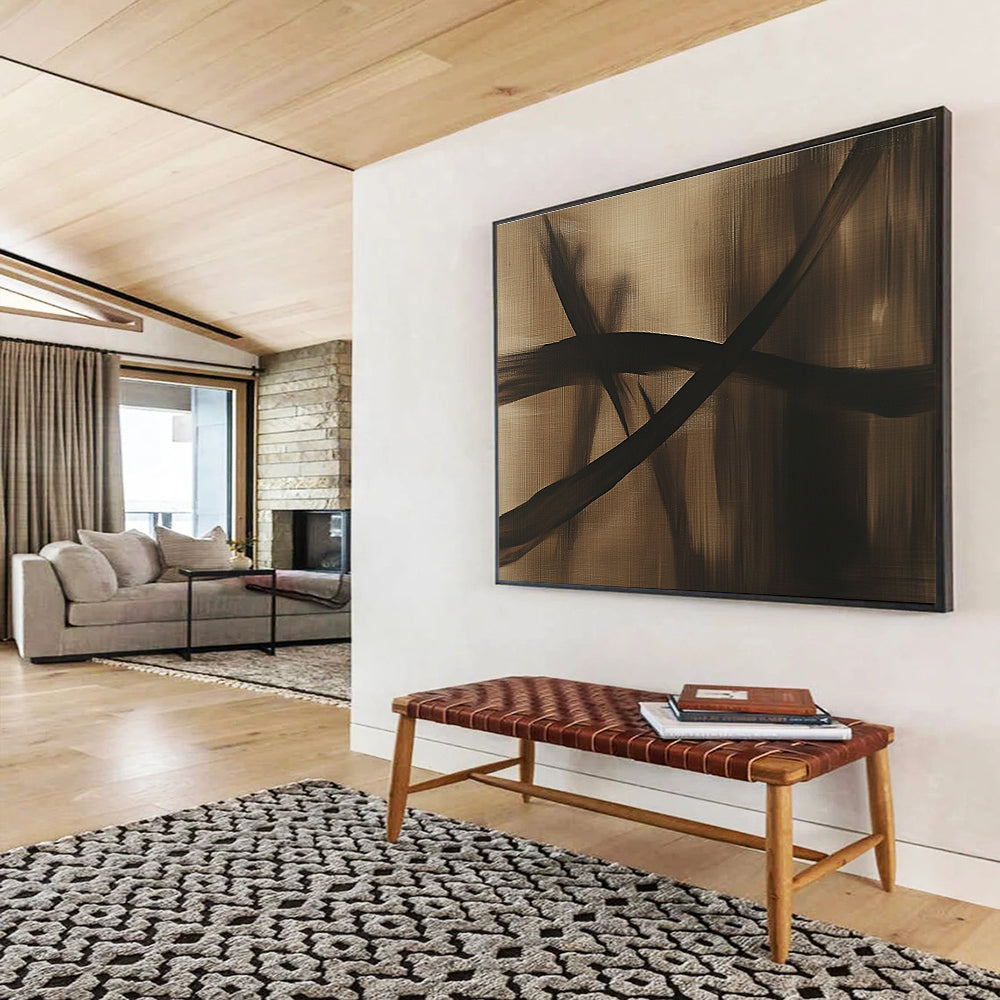 Large abstract painting in brown and black tones featuring a dragonfly silhouette and flowing lines on a dark gray background, exuding mystery and simplicity.SC586