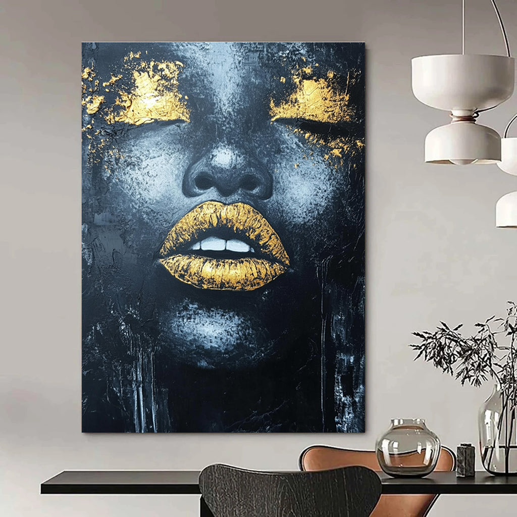 Large abstract acrylic painting of an African woman's lips with gold leaf highlights and textured black background.STSC1276