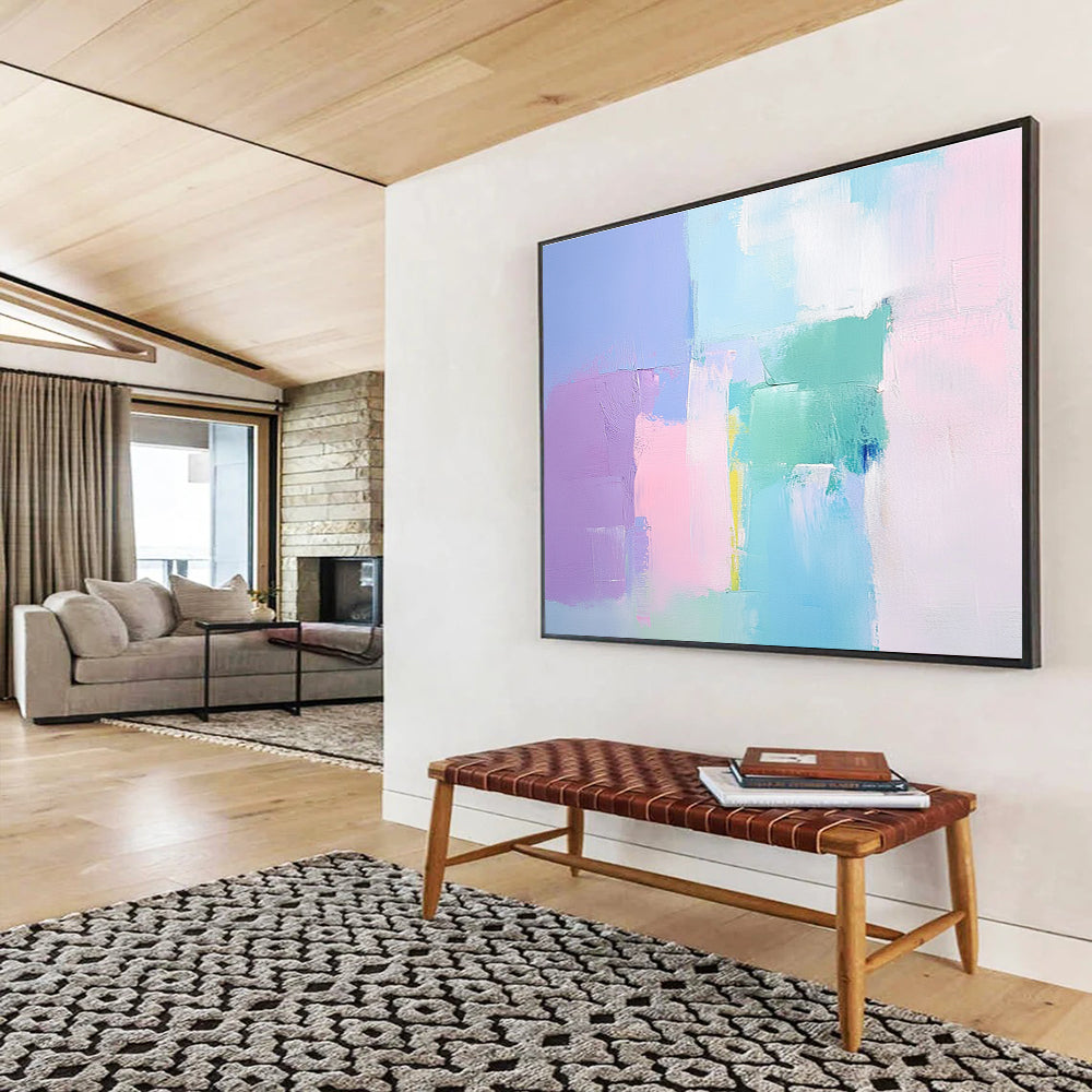 Large abstract painting with soft pastel colors thick brush strokes and a minimalist impressionist style featuring pink blue and light green tones.SC255