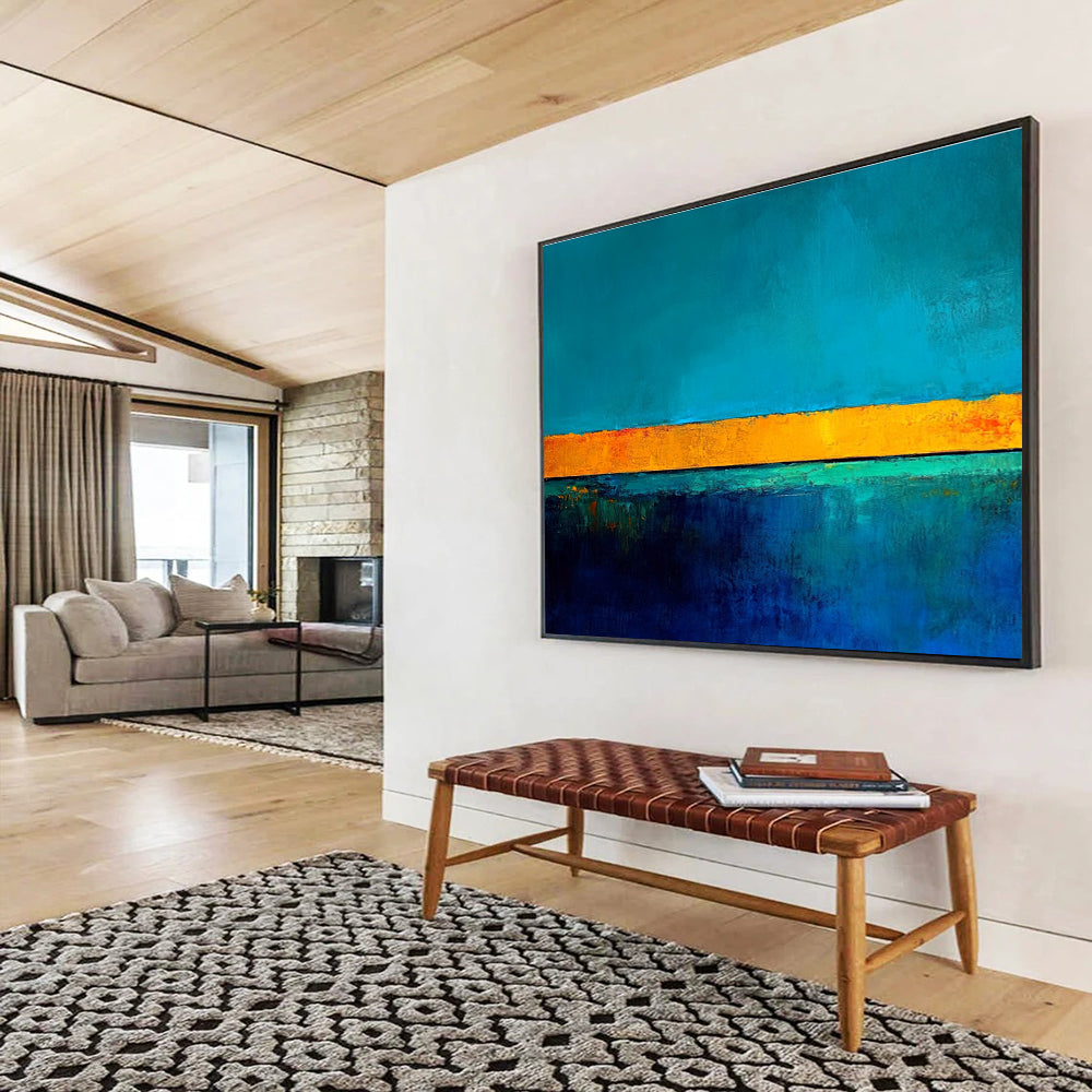 Large abstract painting featuring bold blue and yellow contrasts with a tranquil turquoise base and gold lines inspiring serenity and calmness.SC492