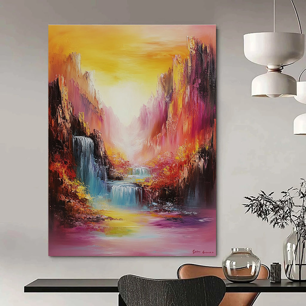 Large abstract oil painting featuring vibrant mountains and waterfalls in rainbow colors with bold brush strokes and a dreamy golden hour landscape.STSC1374