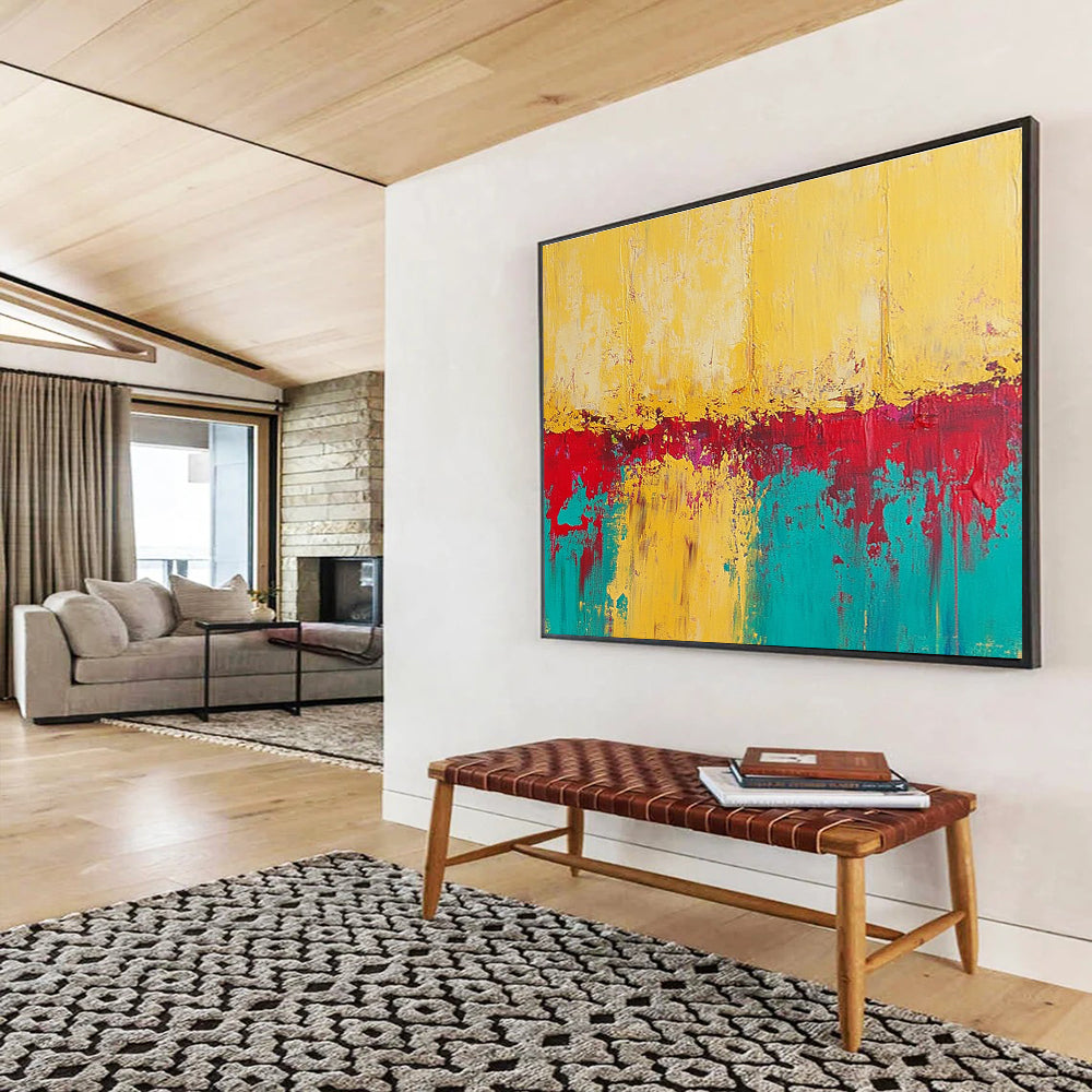 Large abstract painting featuring textured yellow sand with teal and red accents creating a vivid and captivating visual experience.SC269