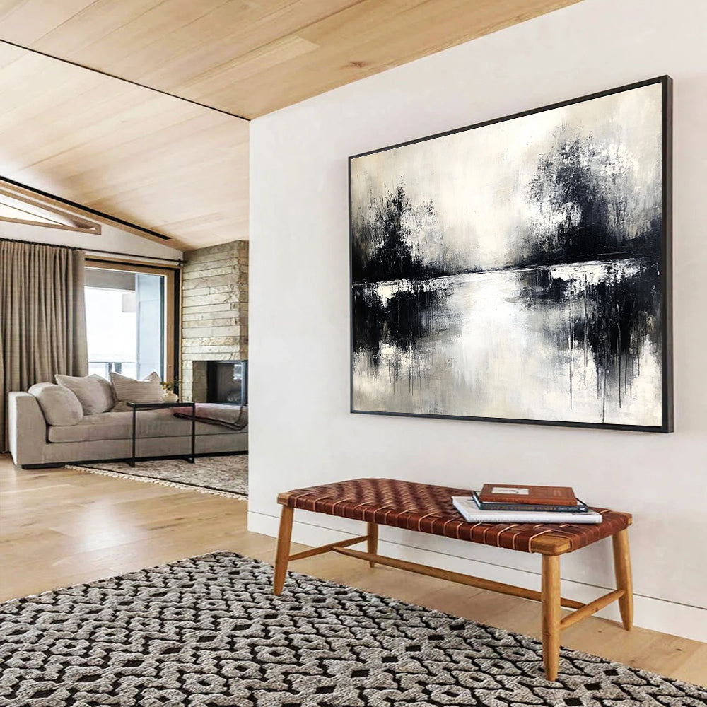 An abstract painting in black and white with neutral tones soft edges on canvas featuring atmospheric elements and a serene water reflection.SC056
