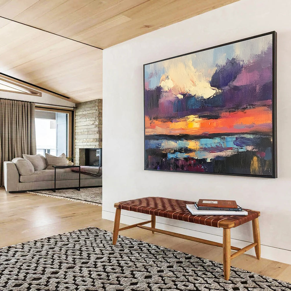 Large abstract painting featuring a sunset over water with bold brush strokes in vibrant purple and blue hues capturing a dramatic sky filled with clouds.SC134