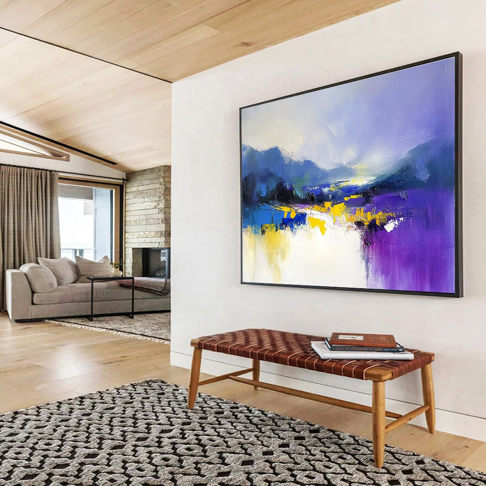 Large abstract painting featuring soft purple and blue hues with yellow accents created using loose brush strokes for a calming effect.SC317