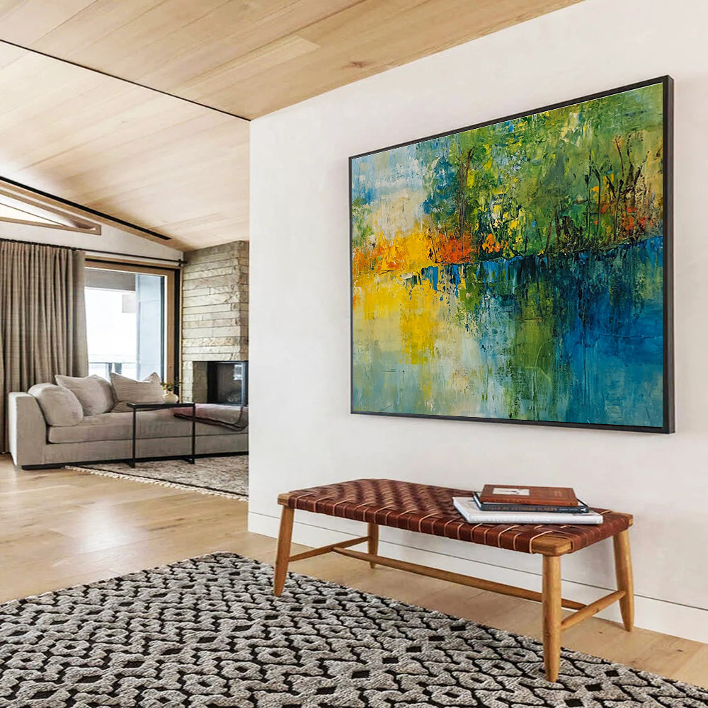 A large abstract painting featuring a vibrant landscape with trees a lake and a colorful sky perfect for home decor.SC519
