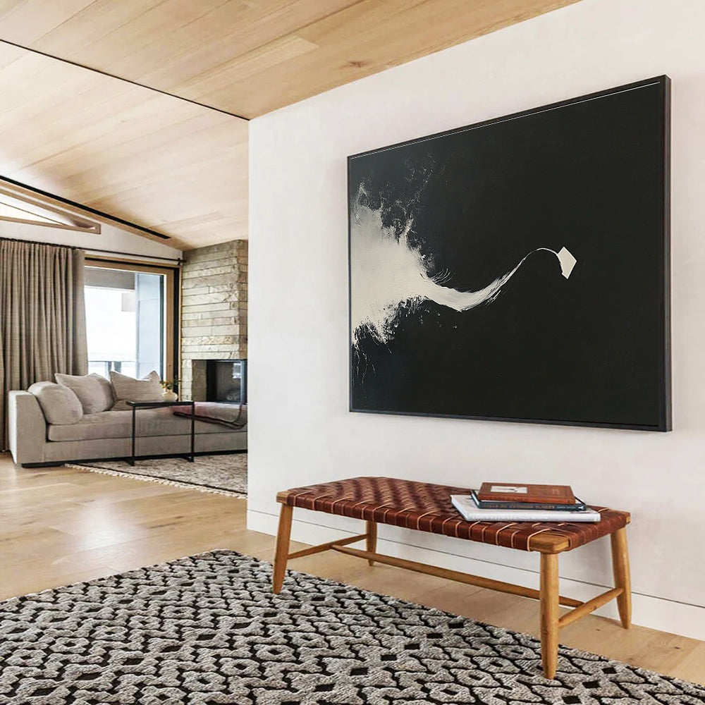 Large abstract painting features white brush strokes on a black background highlighting a curved line and a single floating paper piece.SC096