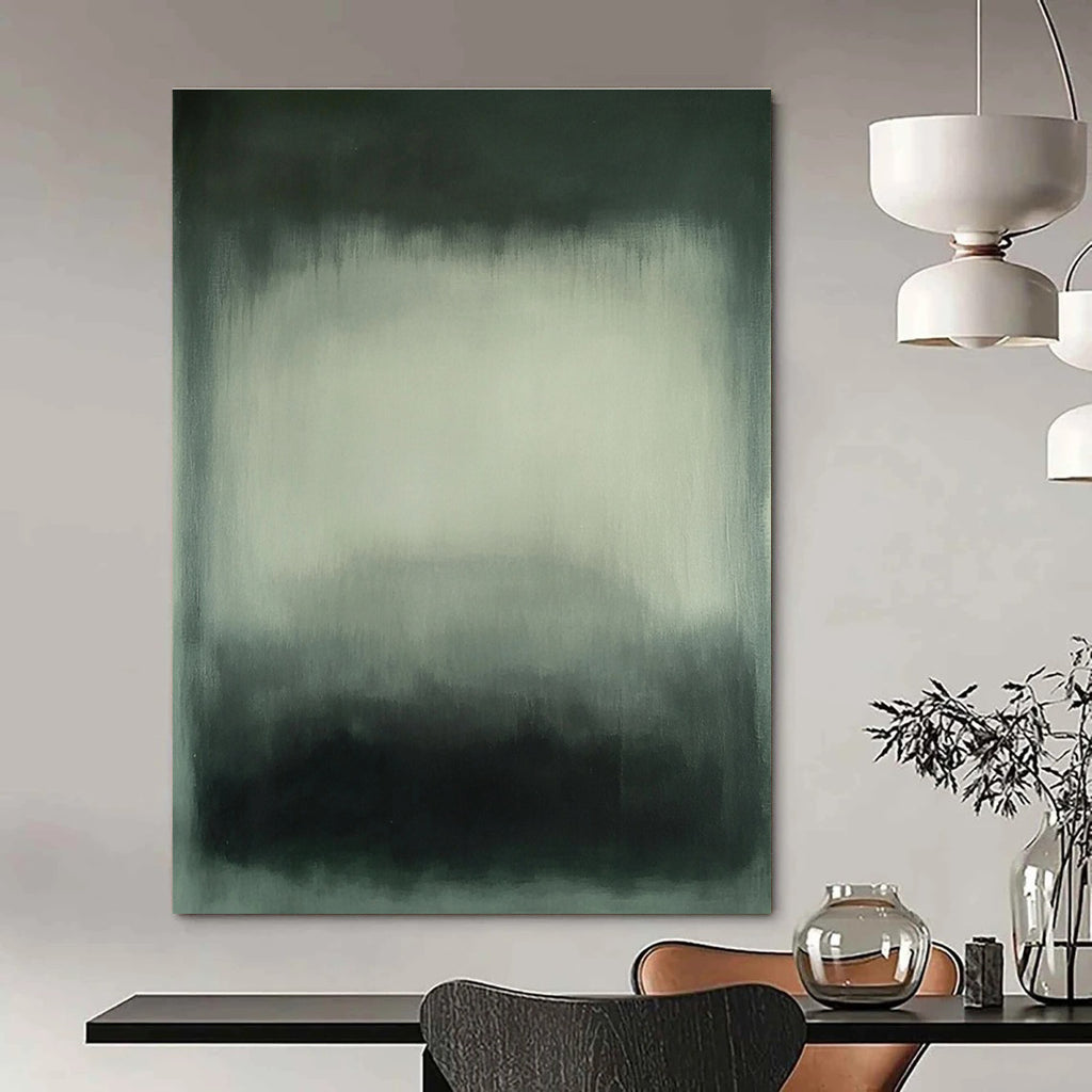 Large abstract painting featuring gray and white hues with blurred edges and a dark green gray background in a soft hazy atmospheric style.STSC683