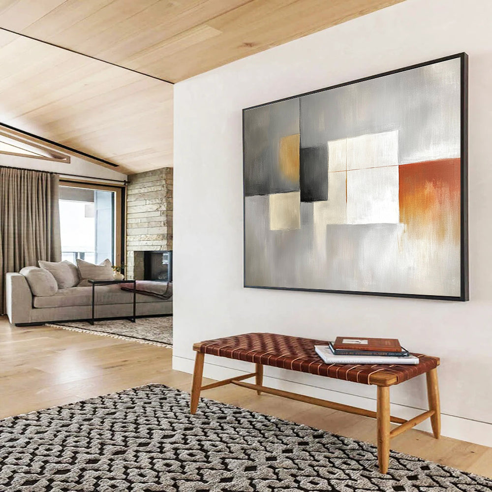 Large abstract painting in light gray, white, and amber featuring simple shapes in a minimalistic modern art style.SC378