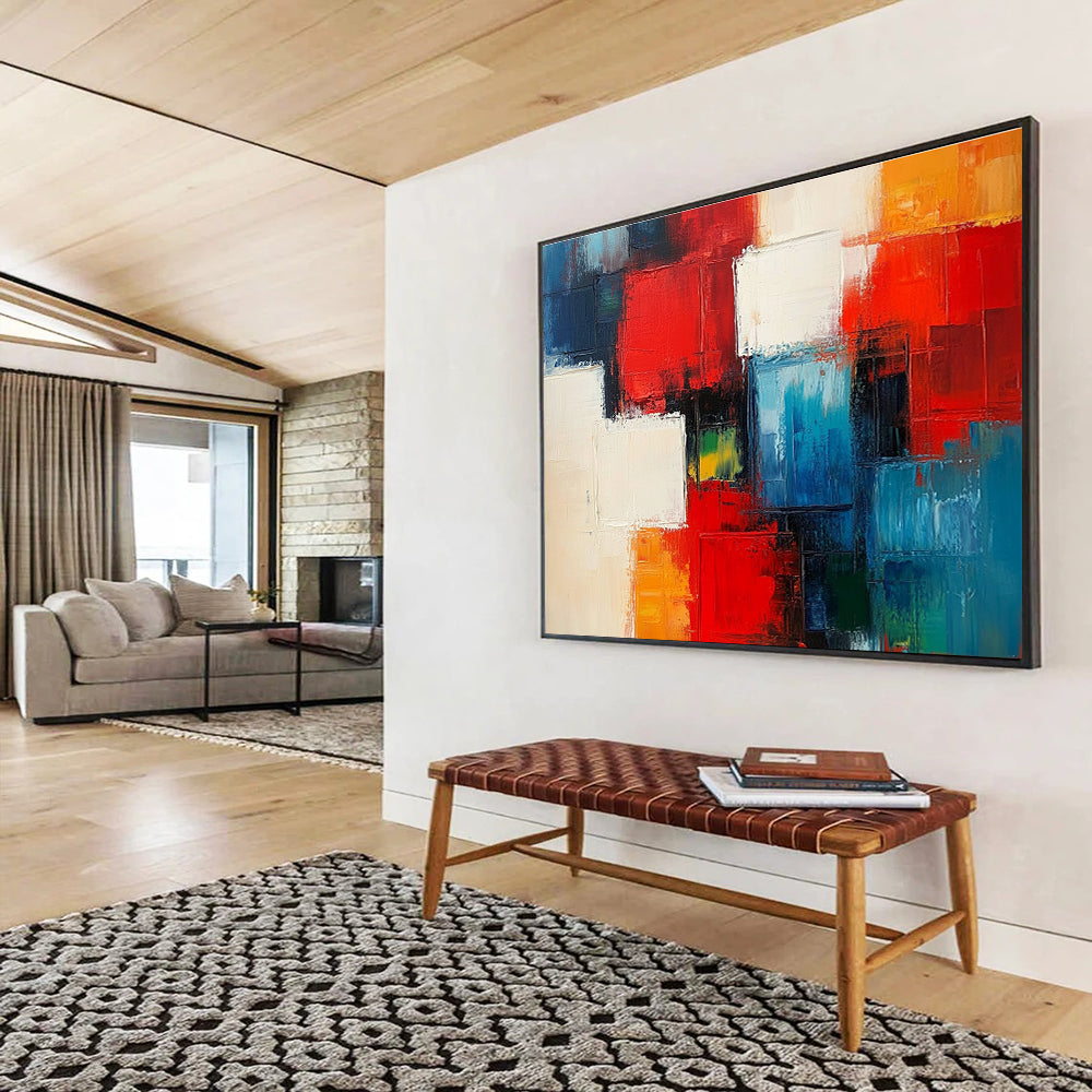 A large abstract painting of city blocks in red and blue with white squares and thick brush strokes.SC347