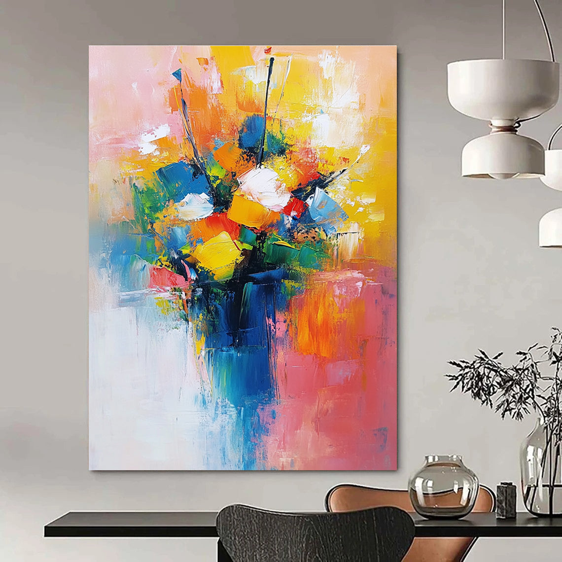 Large abstract painting featuring a vibrant bouquet in yellow blue and red with a light pink orange background conveying joy and calmness.STSC251
