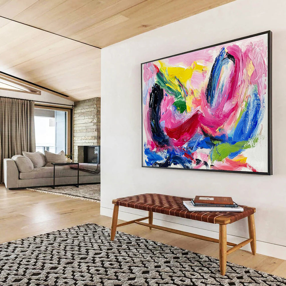 Large abstract painting featuring vibrant pink and blue hues thick brush strokes and dynamic black swirls with red lines and green shapes on a white backgroundSC150