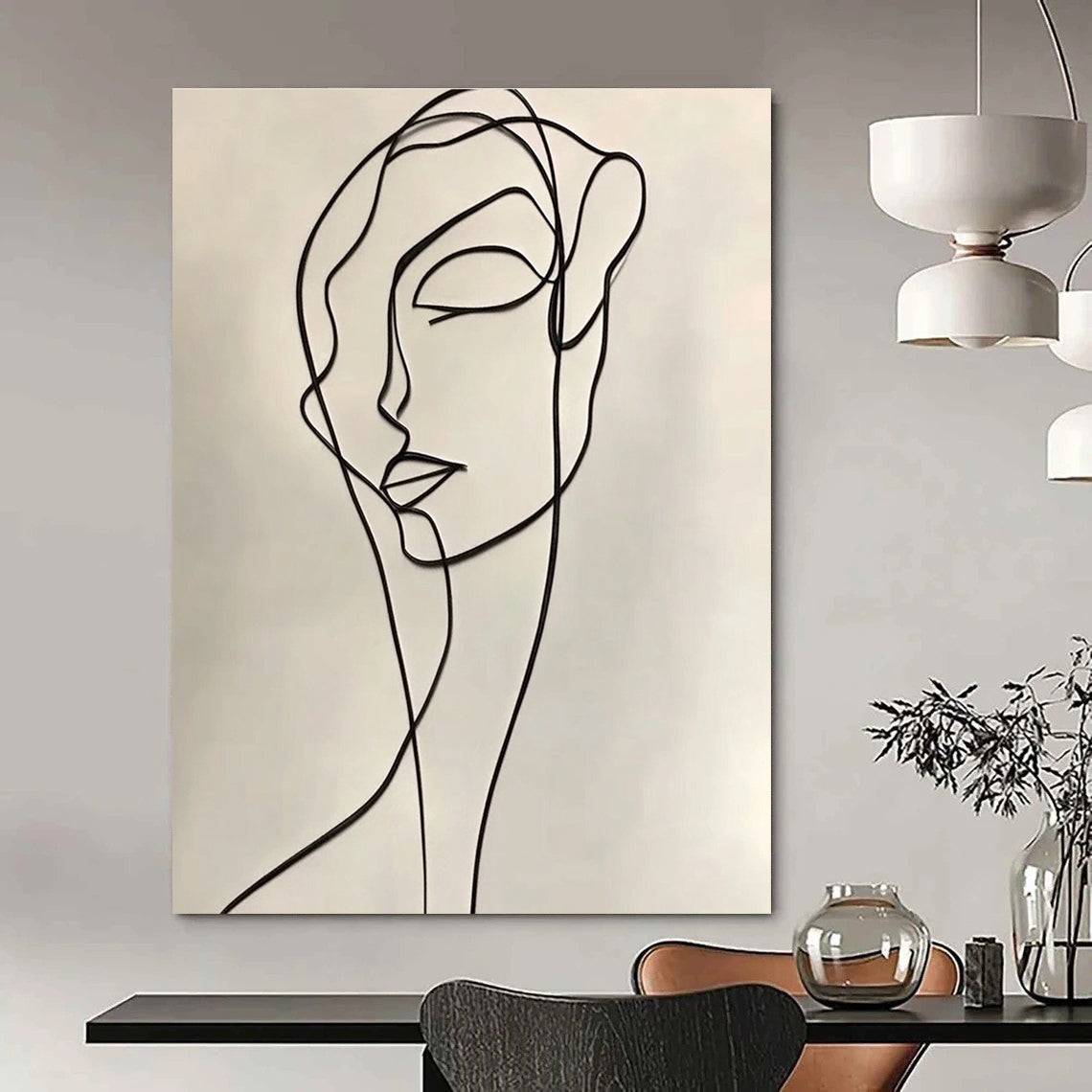 A large abstract drawing featuring a continuous line contour of a woman in elegant black ink on a white background, inspired by Henri Matisse.STSC1190
