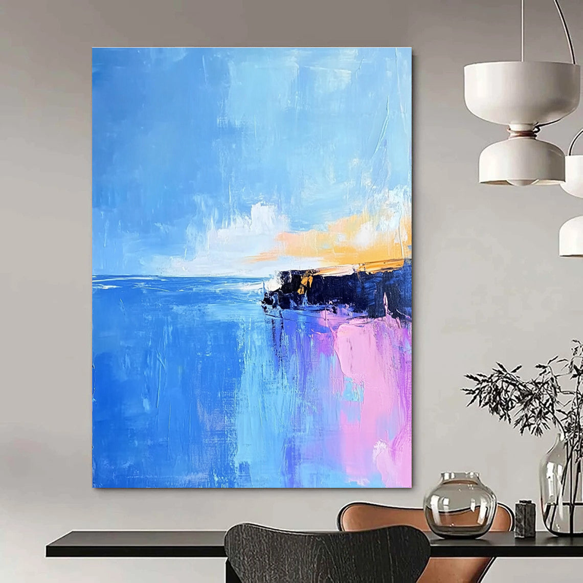 Large abstract painting of Pointe du Hoc's rocky coast in light pink and baby-blue hues with long brush strokes against a vibrant blue sky.STSC598