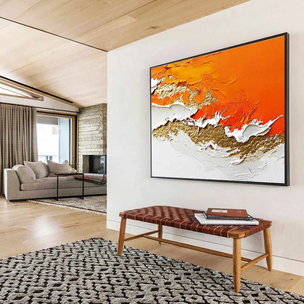 A large abstract painting with layers of orange and white enhanced by gold details and rich texture.SC325
