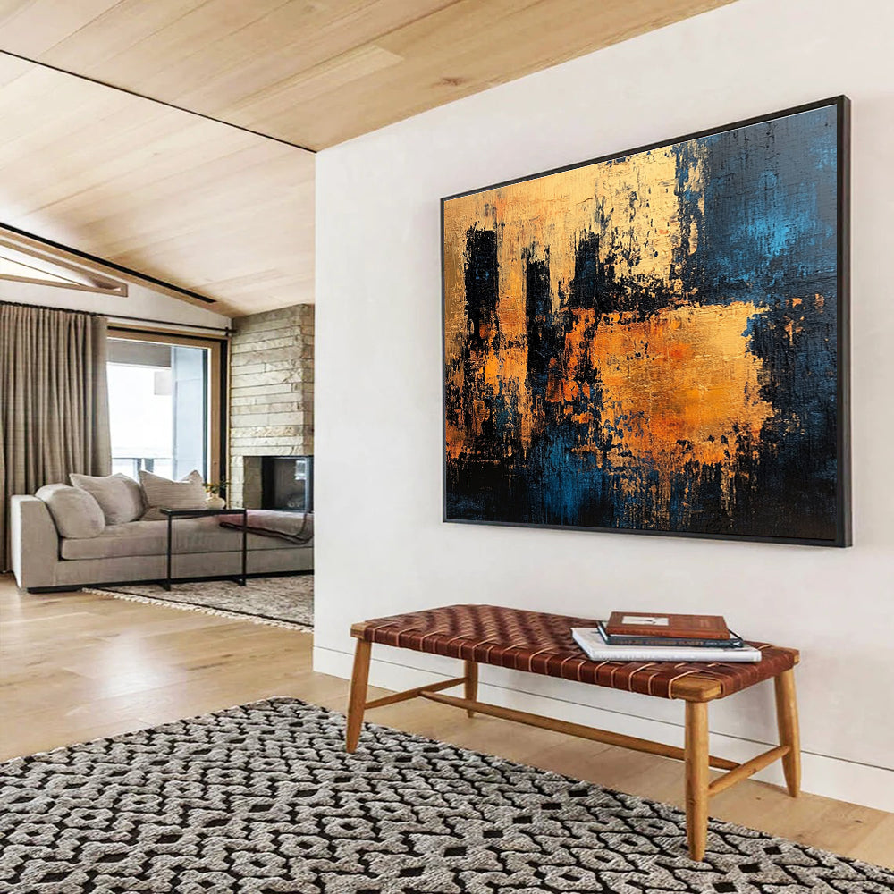 Large abstract painting with textured surface in dark blue and gold suggesting an ancient castle wall radiating warmth and history.SC371
