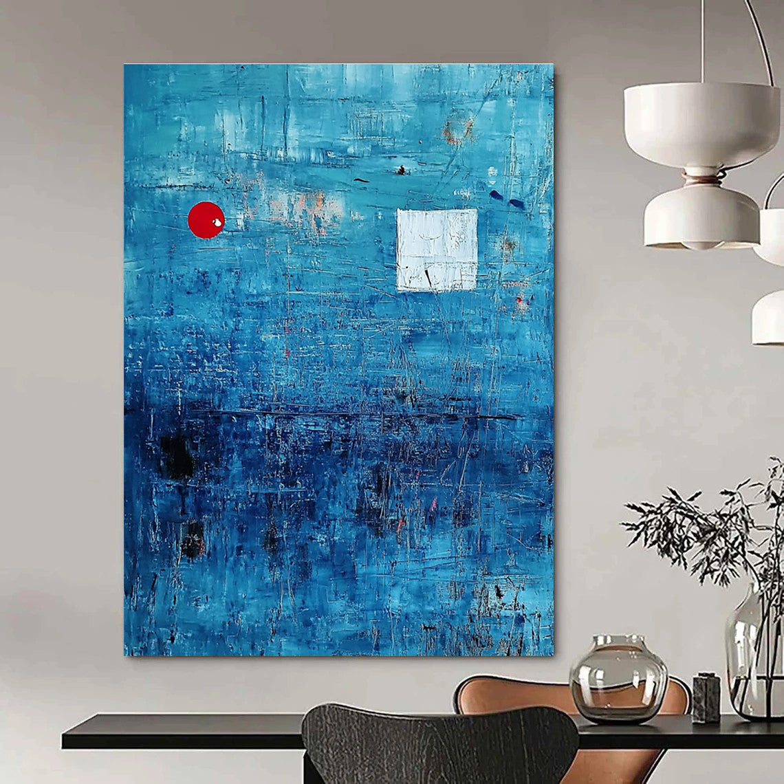 Large abstract painting featuring a serene blue ocean with textured brush strokes and dynamic black lines, accented by a small red circle and white squares.STSC041