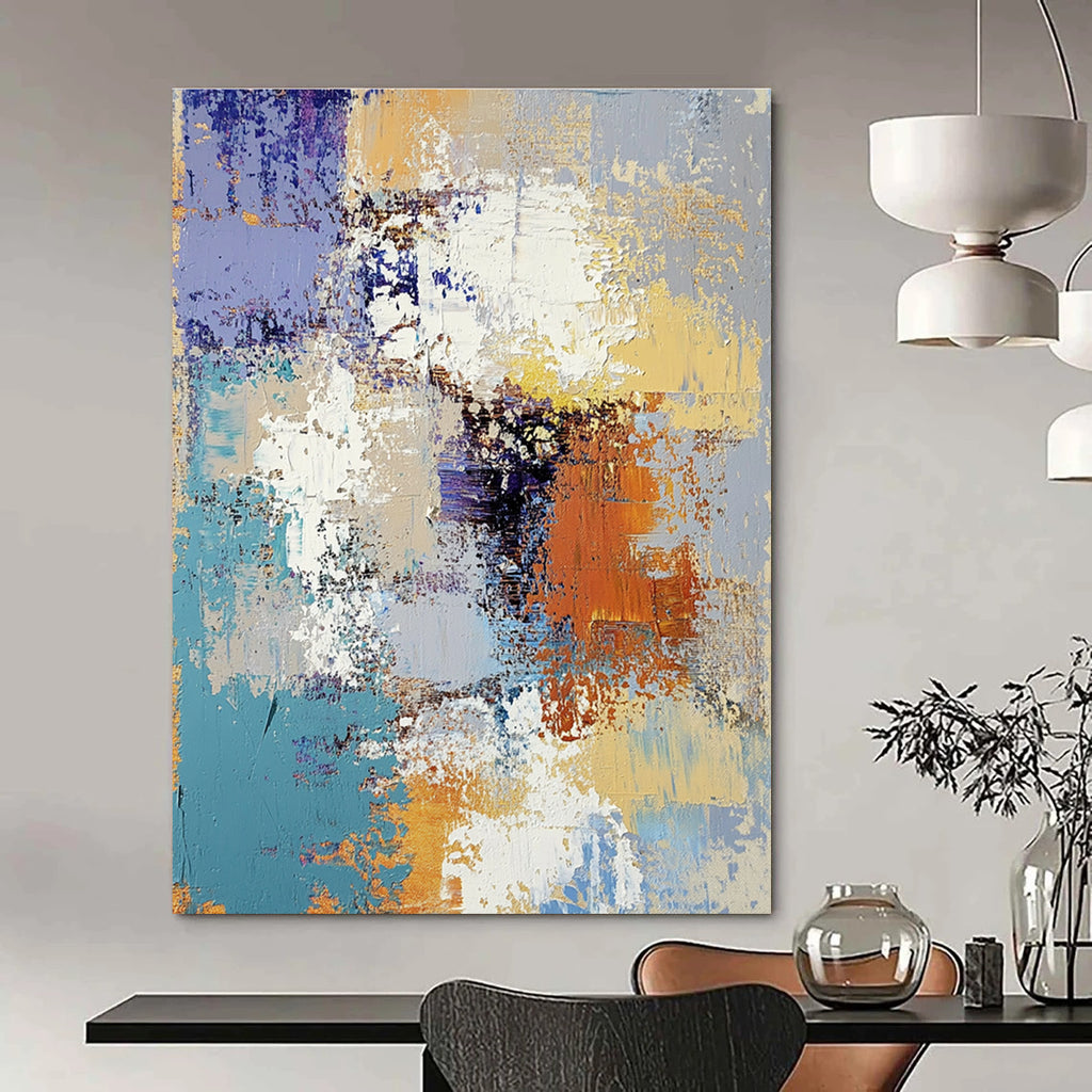 Large abstract oil painting featuring textured layers of blue yellow white gray beige and brown with intricate patterns and emotional depth.STSC584