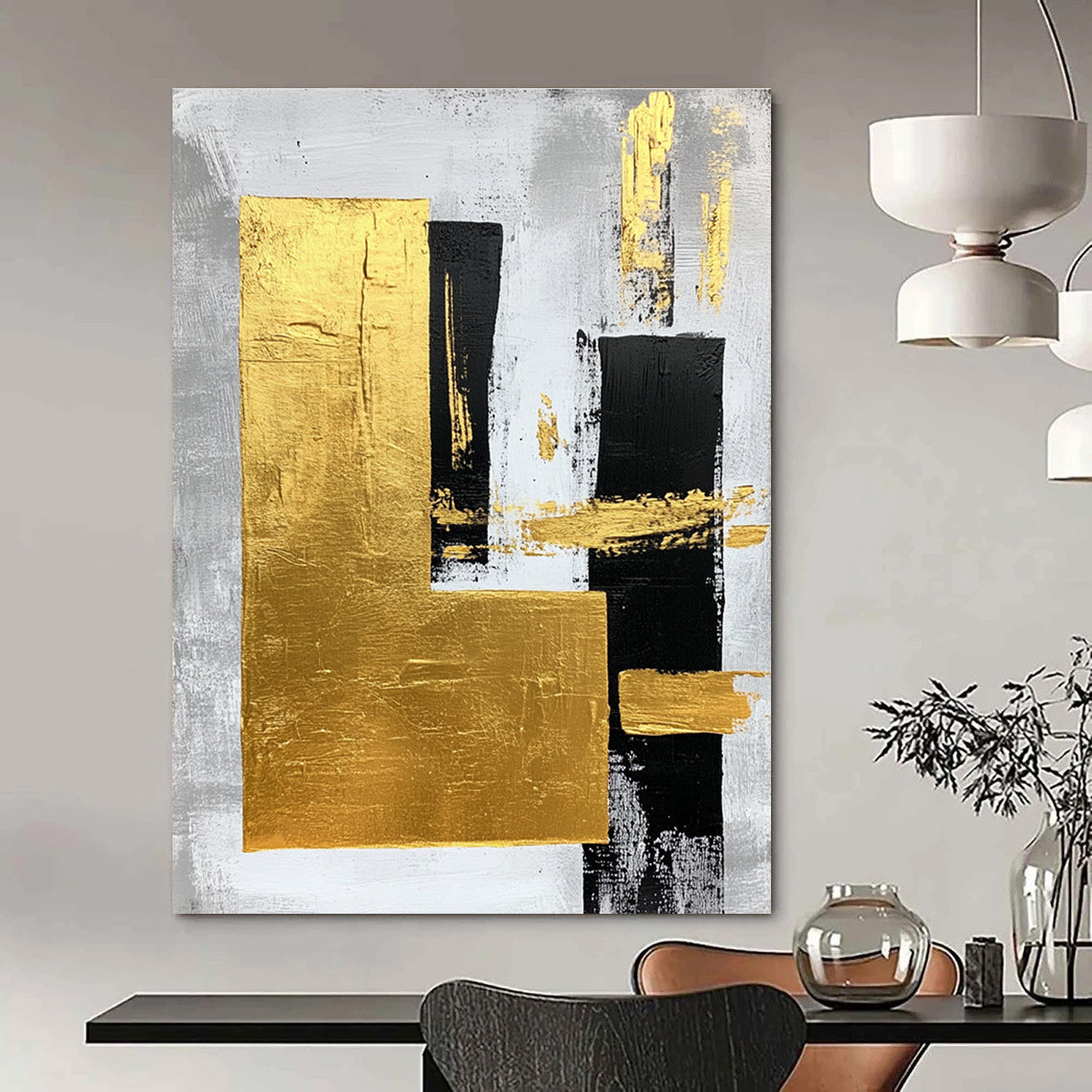 Large abstract art painting featuring gold foil bold strokes and minimalist black lines on a gray background creating an elegant atmosphere.STSC015