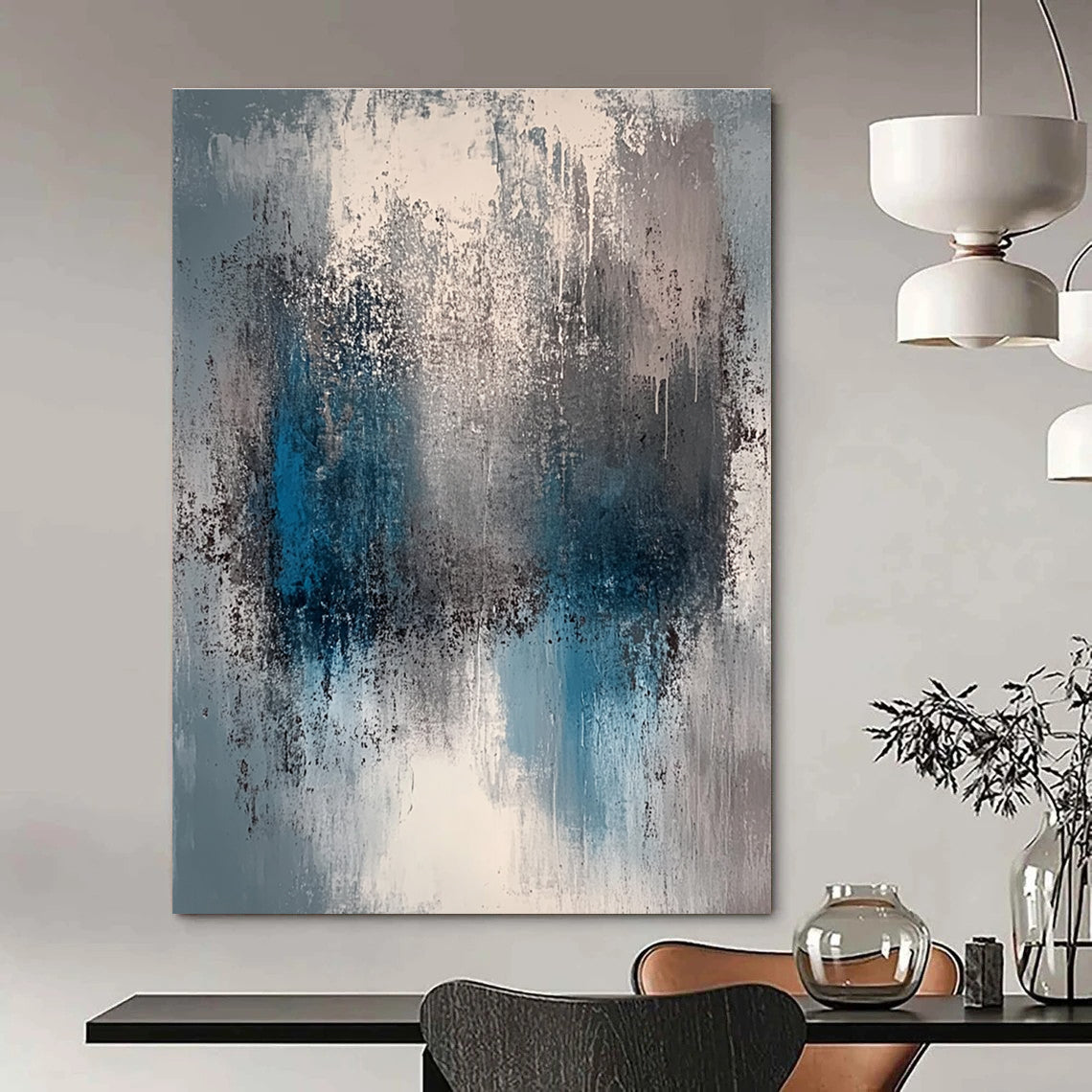 A large abstract painting featuring a faded gray and blue color palette with soft lighting and neutral tones.STSC577