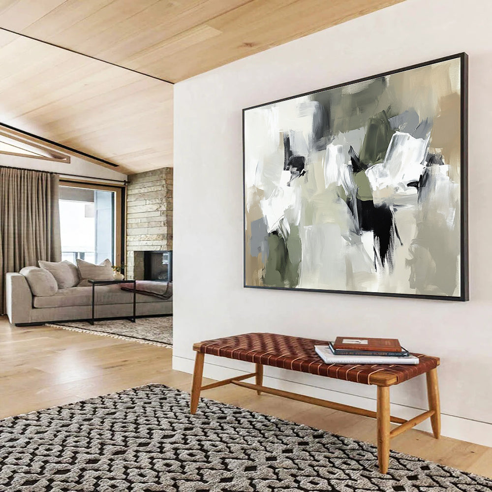 Large abstract painting in neutral tones featuring thick brush strokes and chaotic composition with beige gray and soft edges.SC245