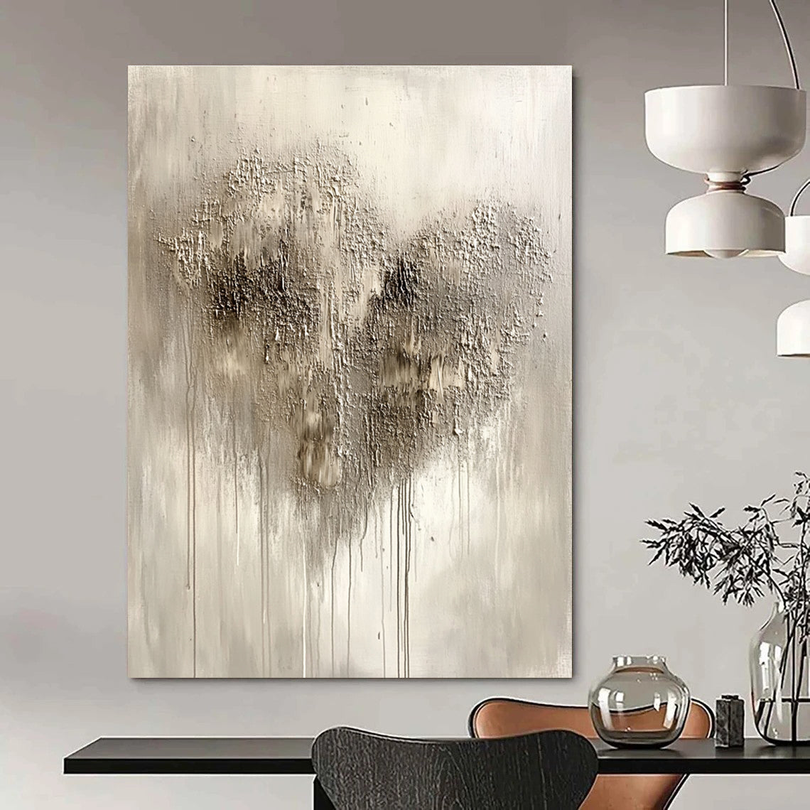 Large abstract painting in silvery gray with impasto texture featuring a heart-shaped pattern and accents of black and dark brown.STSC519