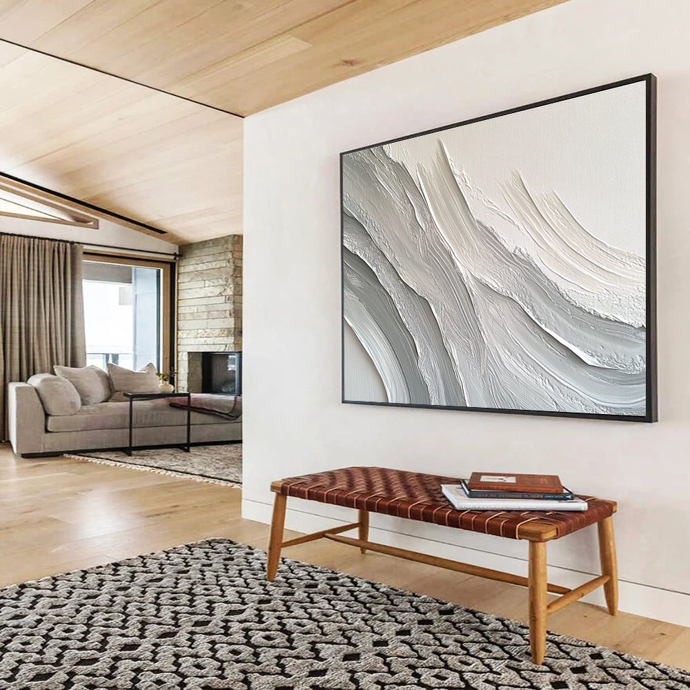Large abstract painting featuring swirling white and gray patterns that create depth and texture against a plain background.SC451