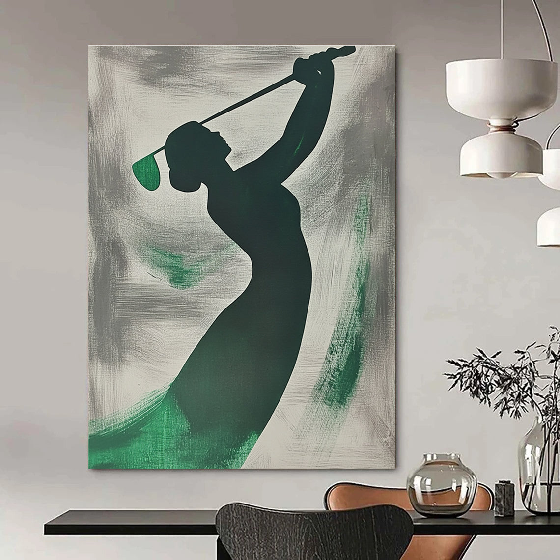 A large abstract painting featuring a silhouette of a woman playing golf with emerald green brushstrokes on a grey background.STSC1065