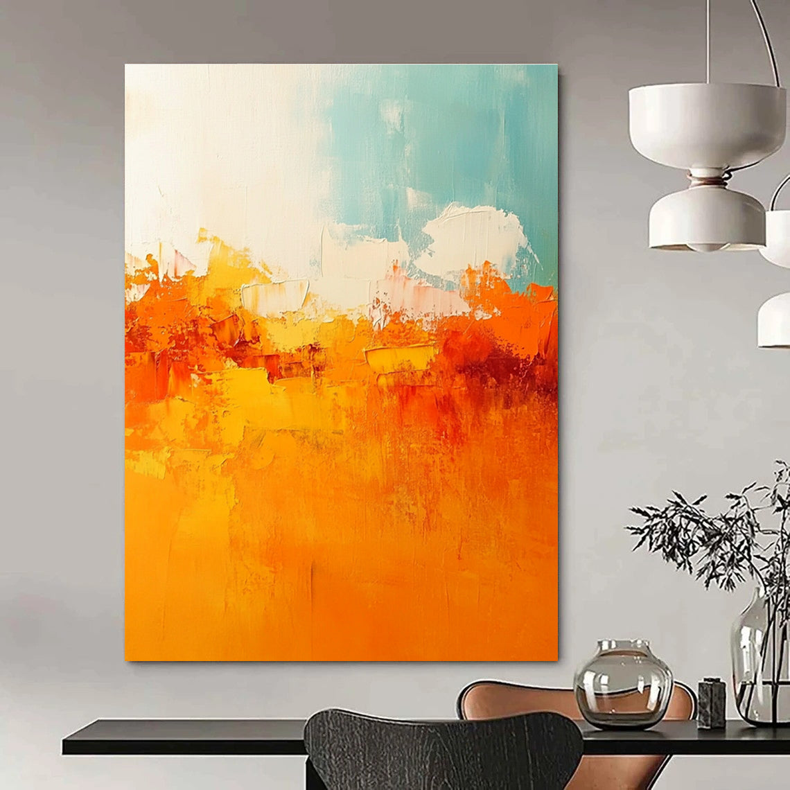 Large abstract painting featuring warm tones of orange and yellow with soft edges and brushstrokes depicting a serene sunset sky.STSC119