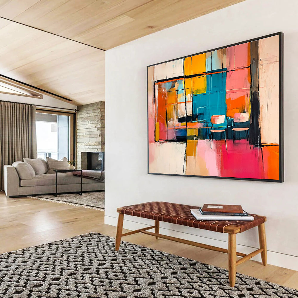 Large abstract painting featuring an interior with chairs and tables visible through a window in vibrant pink orange yellow and blue.SC336