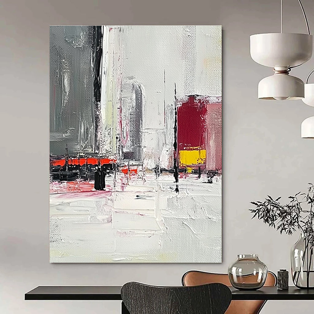 Large abstract painting featuring a grey and white urban landscape with red and yellow accents and thick brush strokes on a textured canvas.STSC154