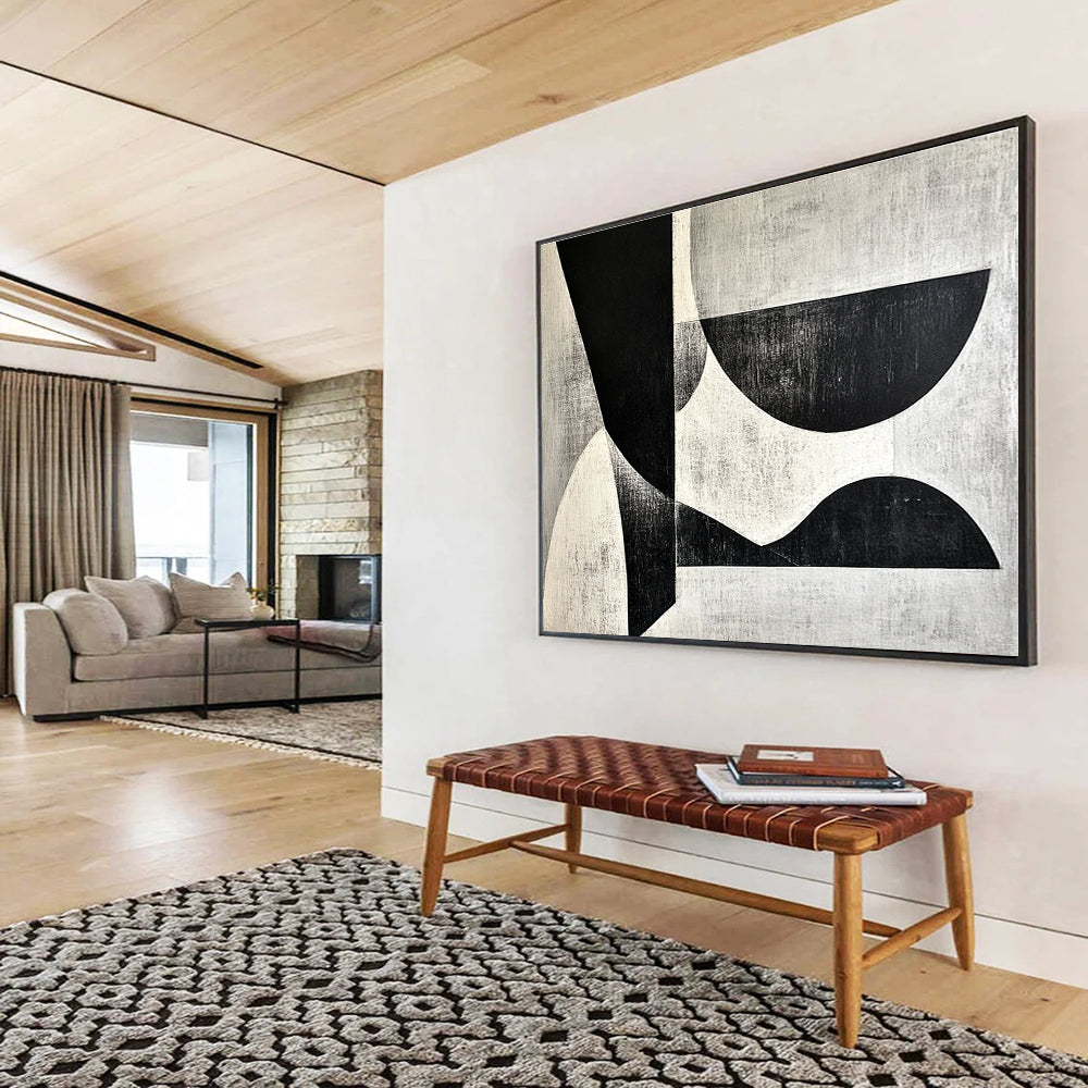 A large abstract painting featuring black and white shapes on a gray background inspired by Wim de Vries artistic style.SC506