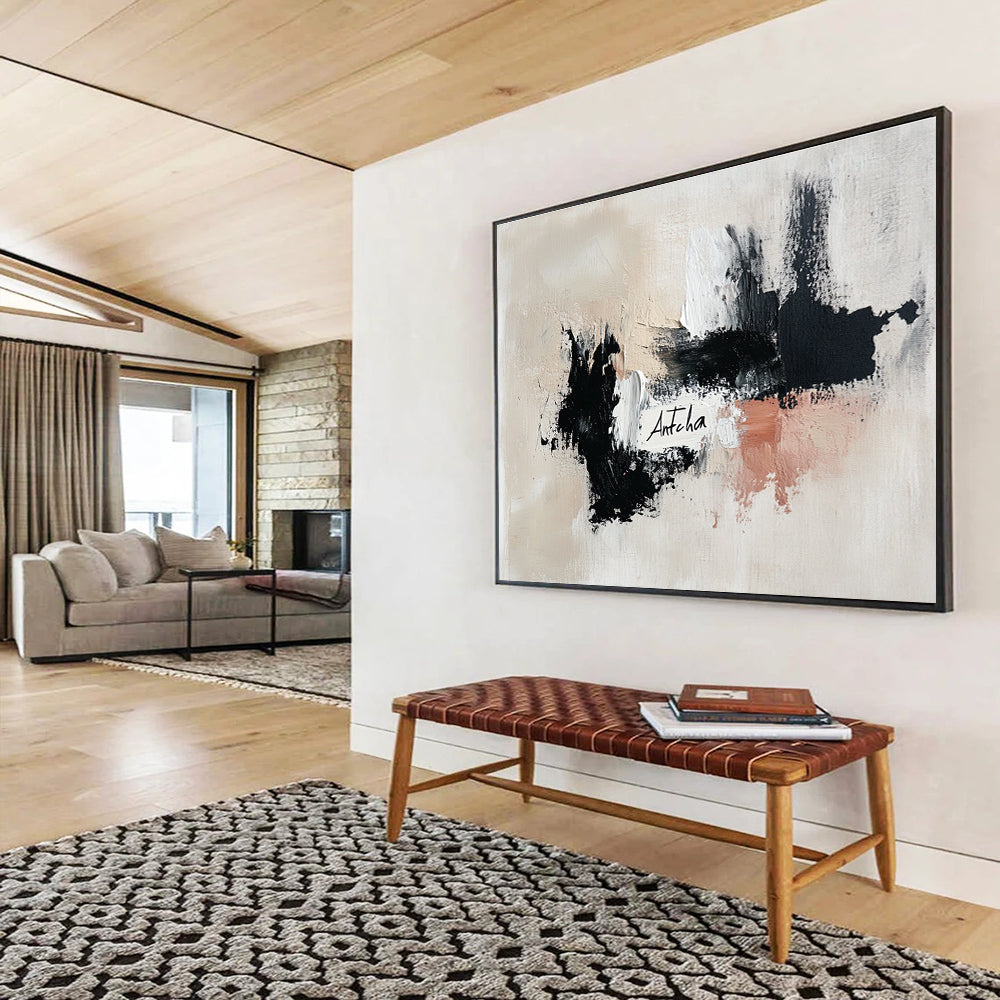 Large abstract painting featuring the word Antcha in soft black and white strokes with dynamic brushwork in a harmonious palette of gray and warm tones.SC311