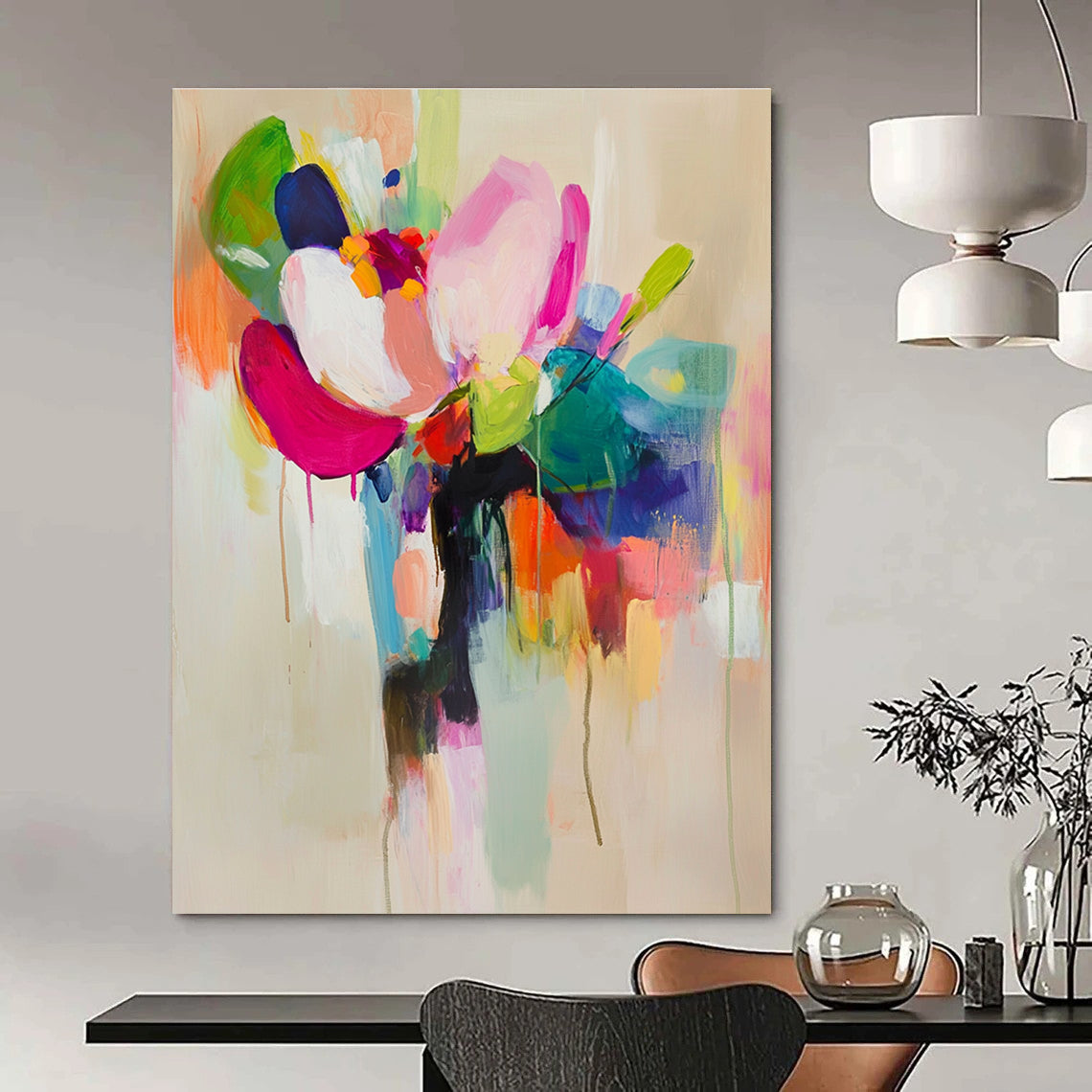 Large abstract painting featuring vibrant colors and soft brushstrokes with a flower in a vase on a light beige background.STSC822