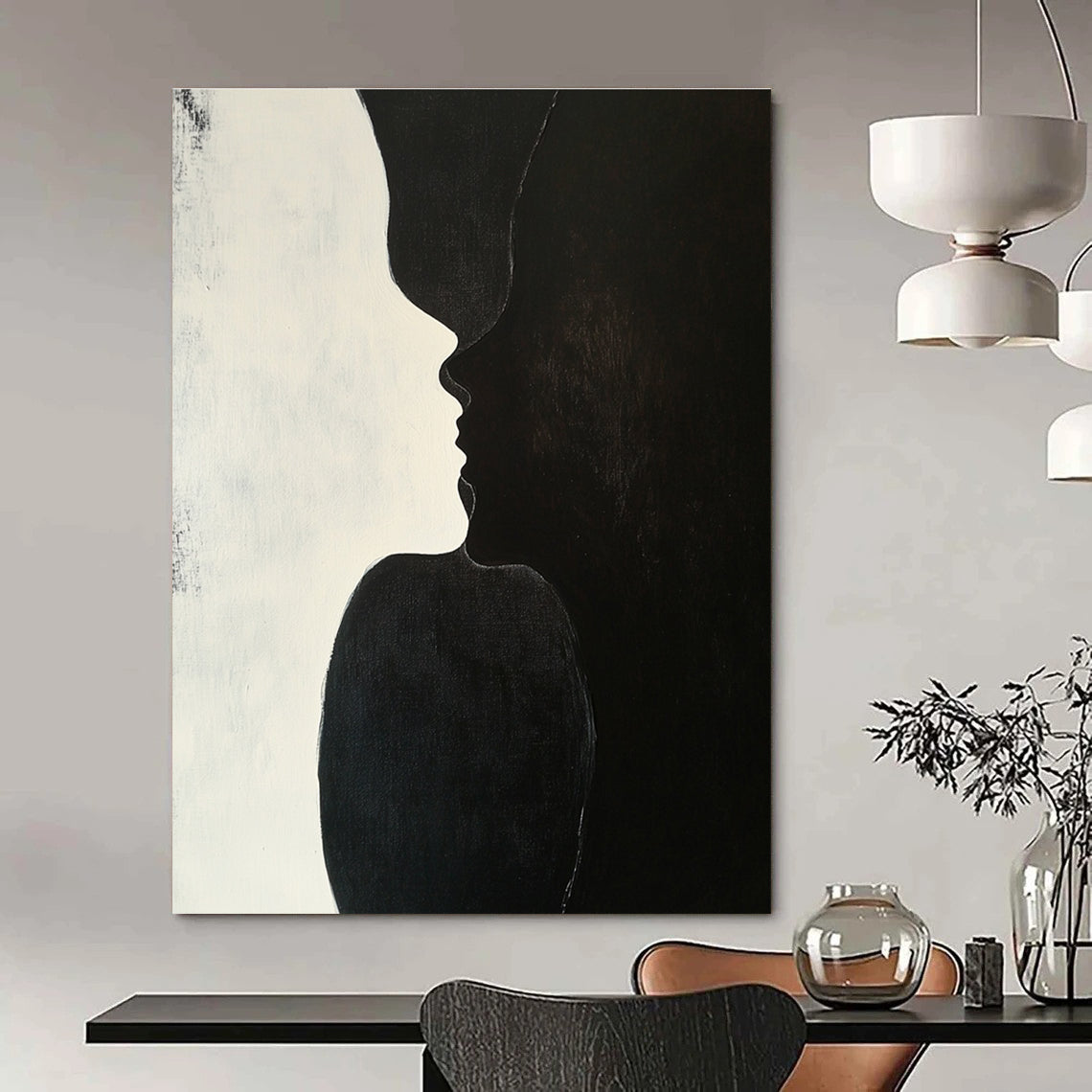 A large abstract painting featuring two figures kissing against a plain black background with subtle shadows highlighting their forms and textures.STSC909