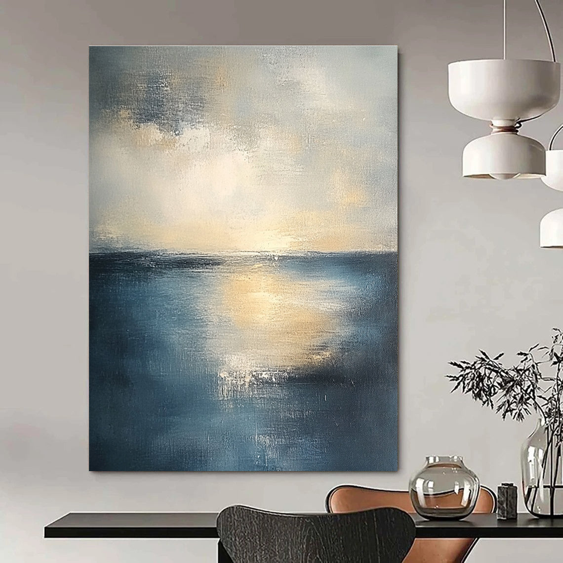 Abstract seascape in muted blue and grey tones with warm yellow sunlight evoking tranquility and reflection on canvas using soft oil paint gradients.STSC461