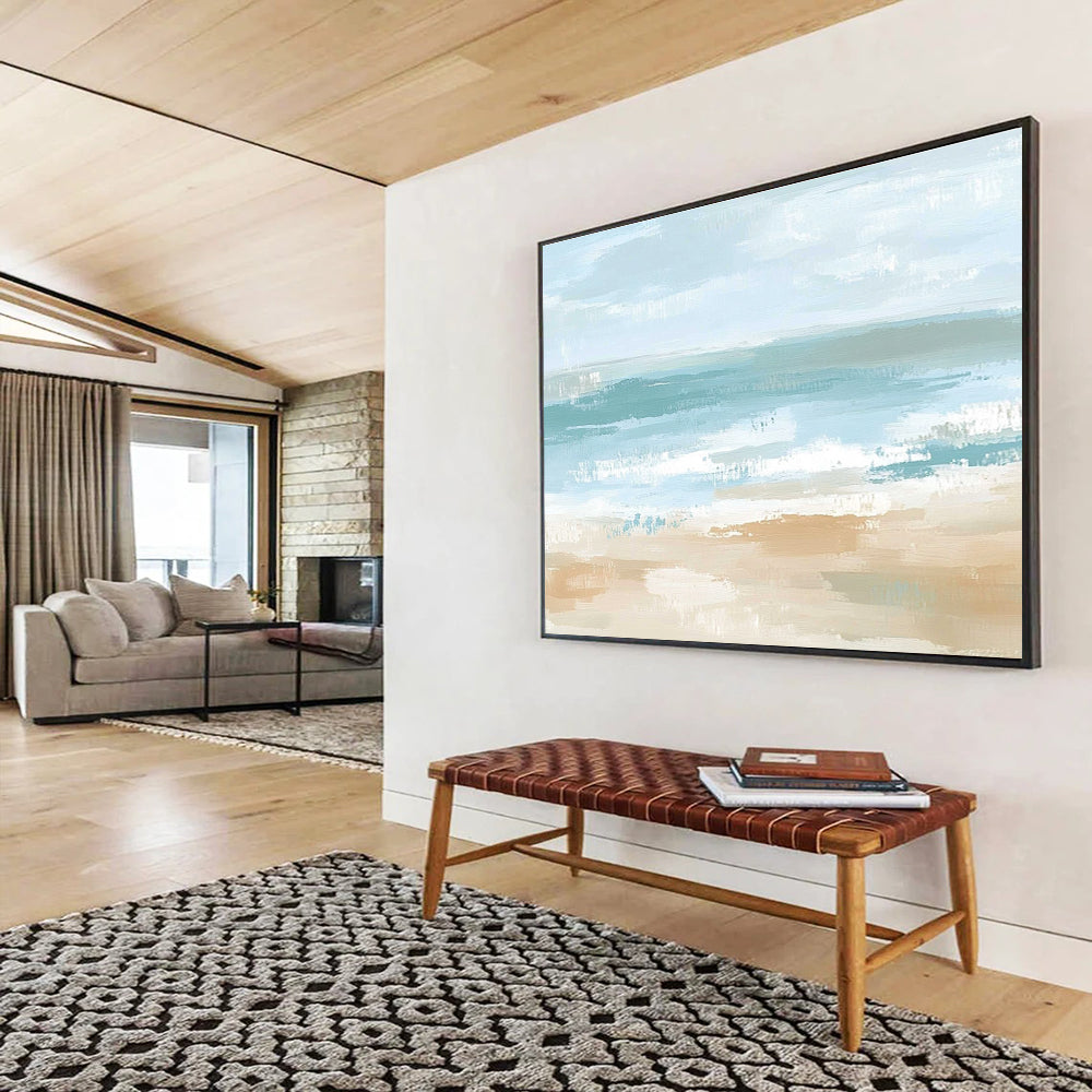 A large abstract painting depicting a serene coastal landscape in soft pastel colors, evoking tranquility with gentle waves and a sandy shore.SC545