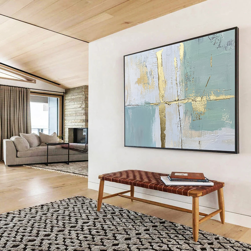 Large abstract painting with pale green and blue lines and shapes enhanced by gold foil accents for an elegant touch.SC326