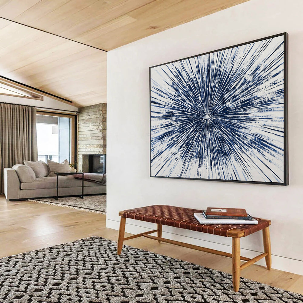 Large abstract painting featuring a blue starburst design with intricate radiating lines, creating a vibrant and energetic composition on a white background.SC430