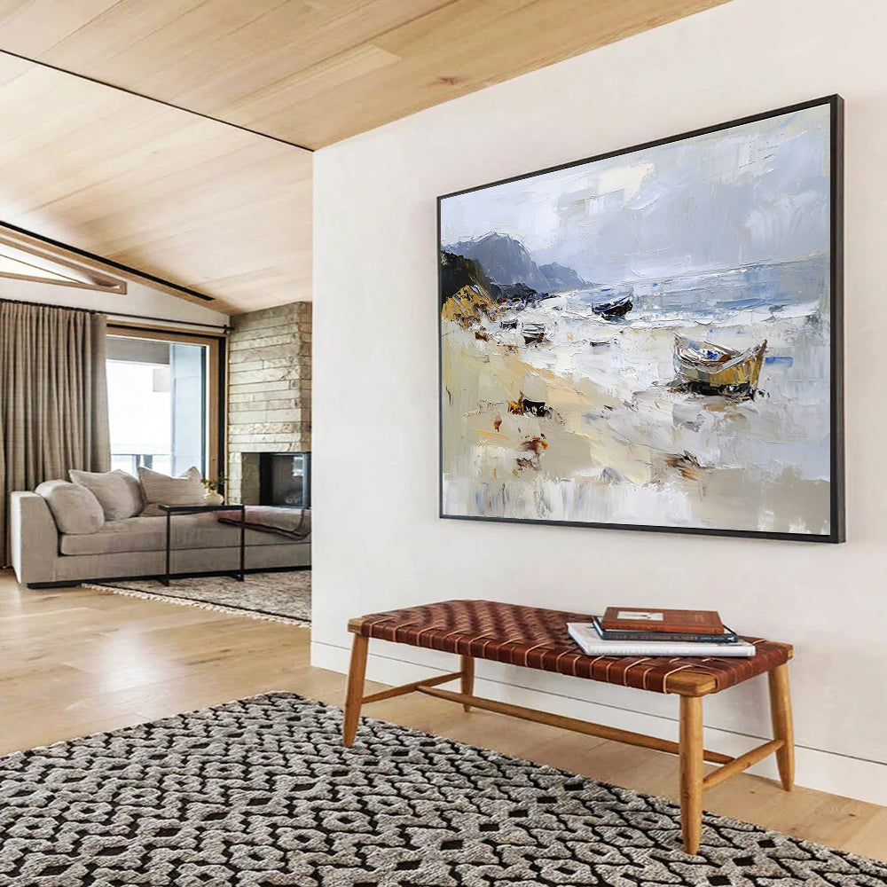 Large abstract oil painting of a beach with loose brush strokes featuring white gray and brown colors and visible sea spray and mountains in the background.SC605