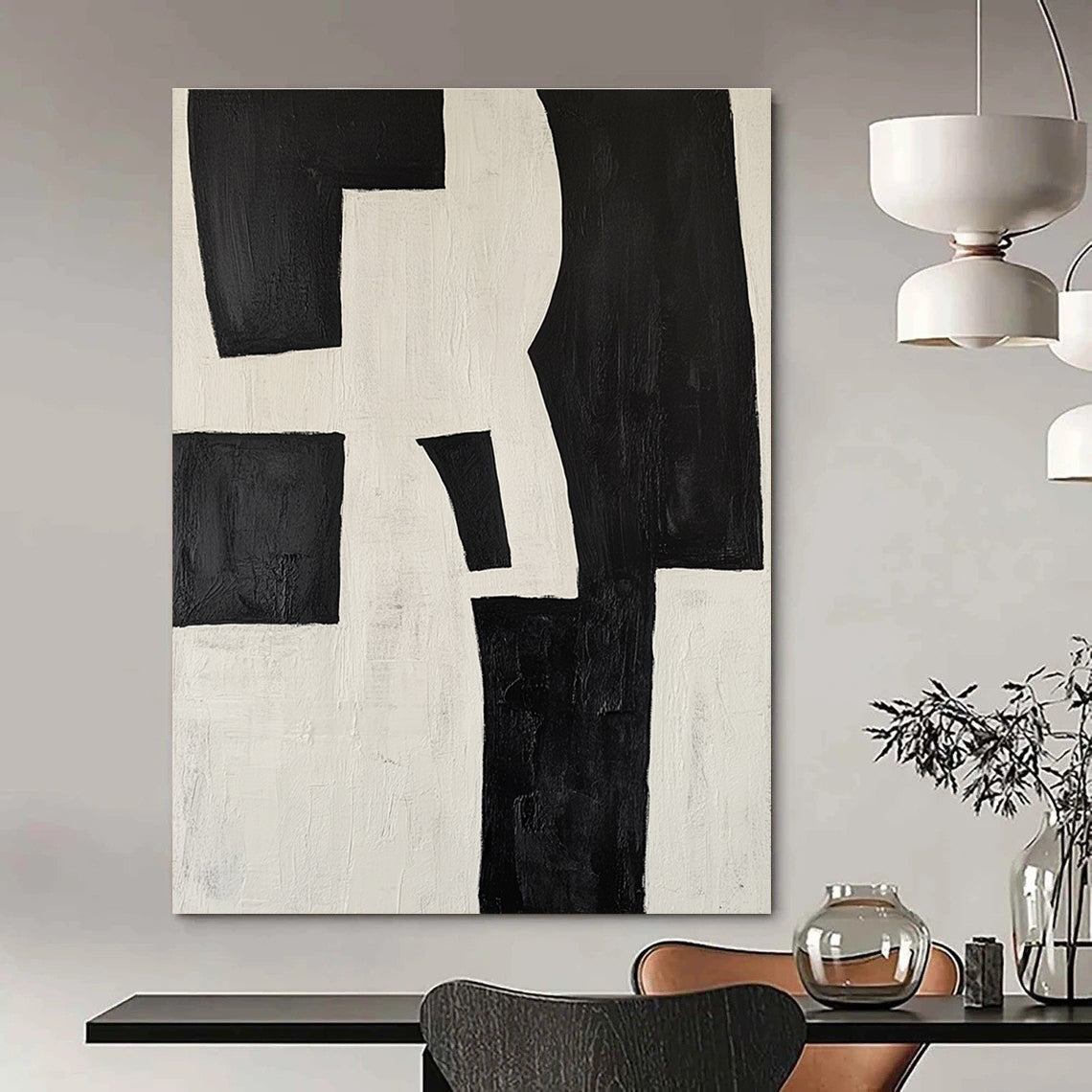 Large abstract painting in black and white featuring deconstructed shapes creating a striking visual impact ideal for modern decor.STSC389