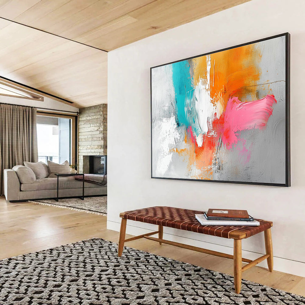 Large abstract painting featuring a light gray background with orange and pink splashes, white brush strokes, and vibrant blue accents.SC148